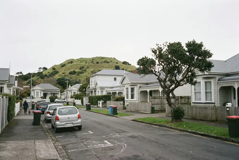 Buying a home in Auckland: a Mount Eden street of restored villas below Maungawhau on a grey winter morning